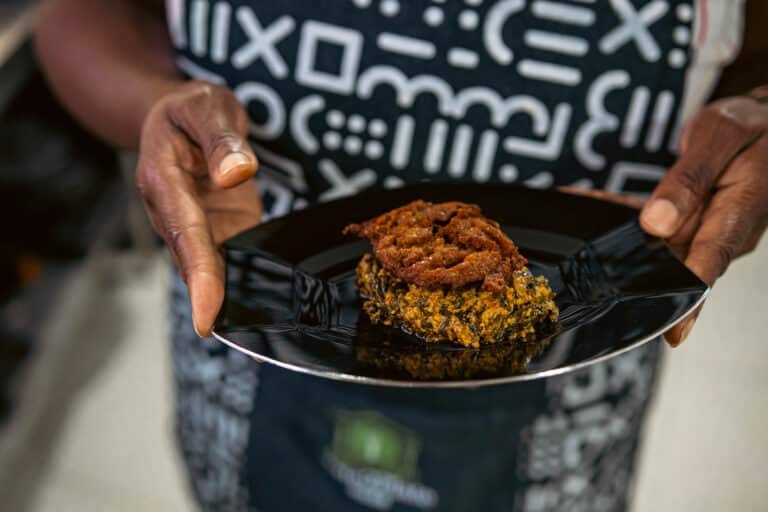 Chef Suzanne Barr presents palava sauce for Plate2Plate