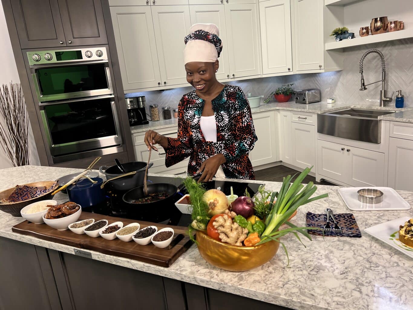 Chef Awo Amenumey preparing Ghanian dishes in her kitchen