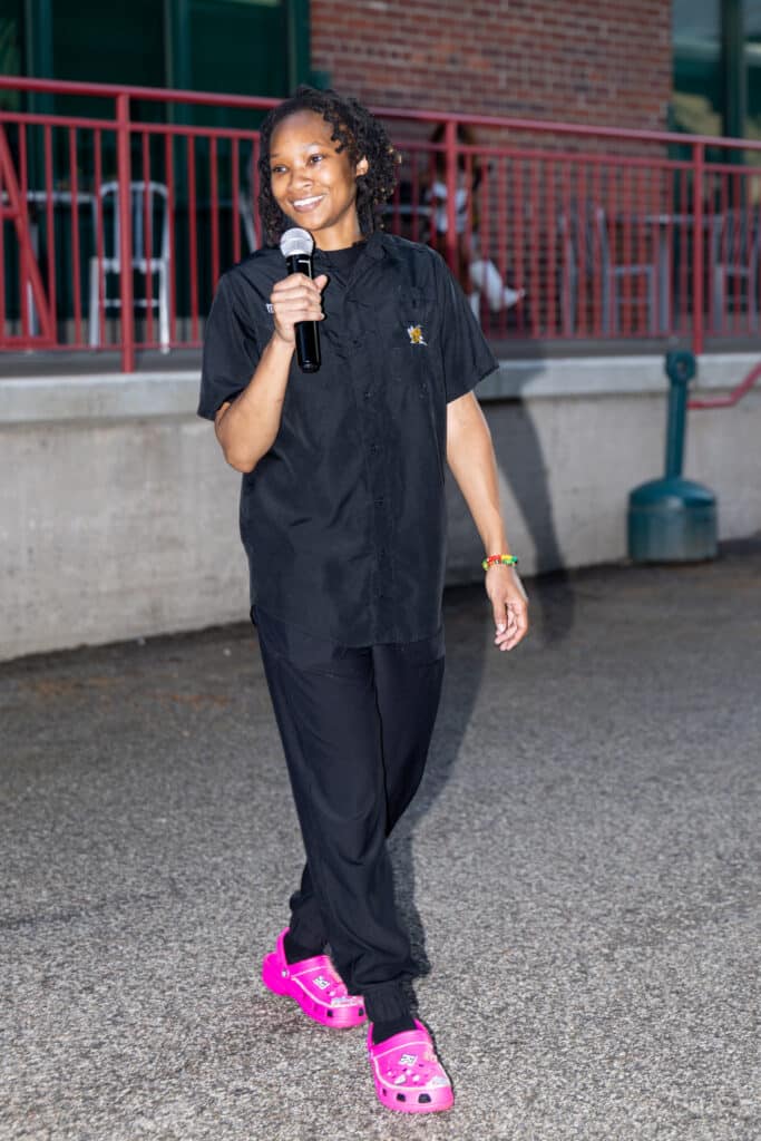 Chef Keyarna Frederick speaking at last year's Juneteenth Farm to Table Dinner