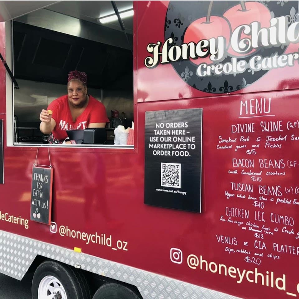 Toni Burnett-Rands of Honey Child Creole Catering in her food truck in Tasmania.