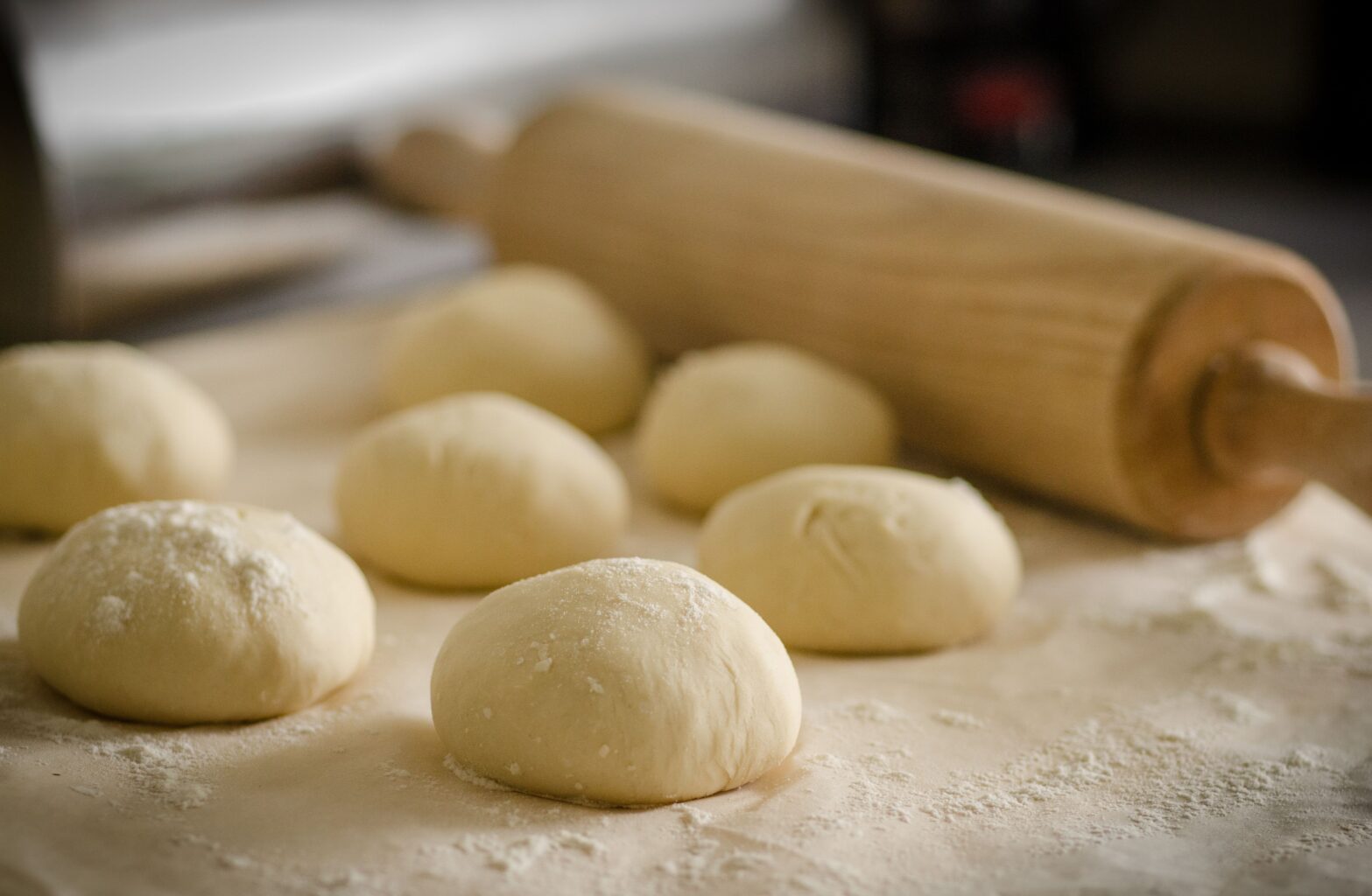 Balls of dough with a roller